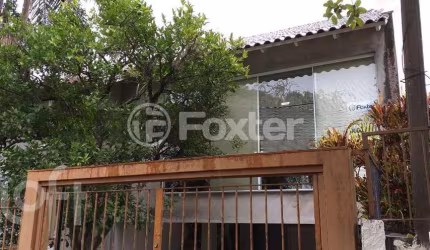 Casa com 3 quartos à venda na Rua Taveira Júnior, 30, Nonoai, Porto Alegre, 305 m2 por R$ 1.060.000