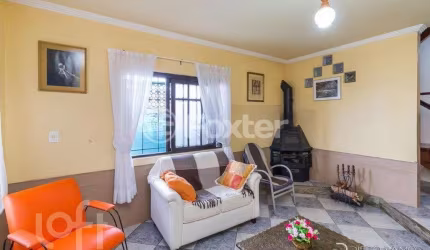 Casa com 3 quartos à venda na Rua Ângelo Passuelo, 420, Vila Nova, Porto Alegre, 296 m2 por R$ 499.000