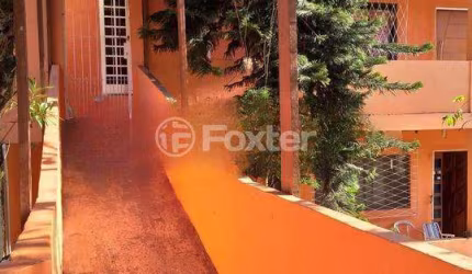 Casa com 4 quartos à venda na Avenida Vicente Monteggia, 283, Cavalhada, Porto Alegre, 200 m2 por R$ 640.000