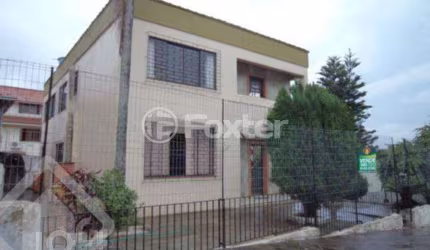 Casa com 5 quartos à venda na Rua Hortêncio Rodrigues Barbosa, 157, Campo Novo, Porto Alegre, 294 m2 por R$ 530.000