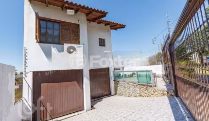 Casa com 4 quartos à venda na Avenida Edu Las-Casas, 565, Parque Santa Fé, Porto Alegre, 237 m2 por R$ 649.000