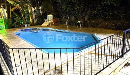 Casa com 3 quartos à venda na Avenida Guaíba, 4572, Vila Assunção, Porto Alegre, 280 m2 por R$ 1.790.000