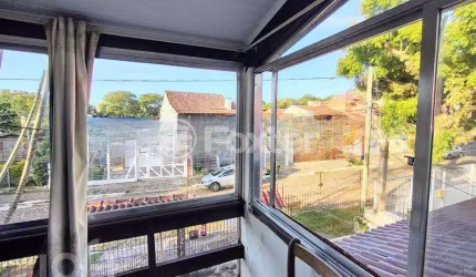Casa com 6 quartos à venda na Rua Fábio de Barros, 388, Nonoai, Porto Alegre, 294 m2 por R$ 693.000