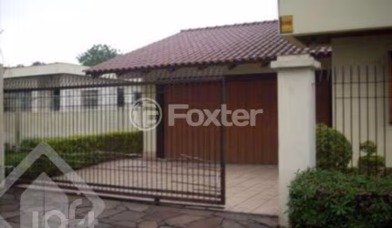 Casa com 4 quartos à venda na Rua Major Sezefredo, 1017, Marechal Rondon, Canoas, 270 m2 por R$ 1.400.000