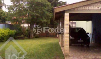 Casa com 2 quartos à venda na Avenida Guarujá, 155, Guarujá, Porto Alegre, 160 m2 por R$ 405.000