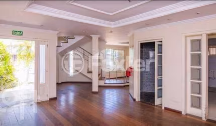 Casa com 3 quartos à venda na Avenida Doutor Sezefredo Azambuja Vieira, 156, Marechal Rondon, Canoas, 438 m2 por R$ 1.840.000