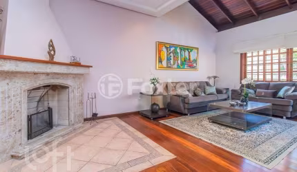 Casa com 3 quartos à venda na Rua Afonso Arinos, 114, Camaquã, Porto Alegre, 274 m2 por R$ 1.200.000