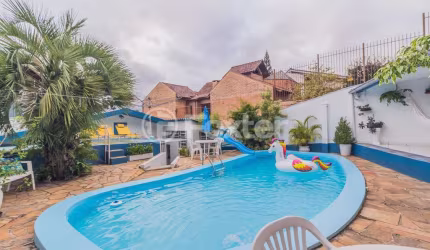Casa com 4 quartos à venda na Rua Santo Camaratta-Santino, 6, Parque Santa Fé, Porto Alegre, 176 m2 por R$ 742.000