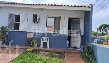 Casa com 2 quartos à venda na Rua Roberto Francisco Behrens, 200, Mato Grande, Canoas, 49 m2 por R$ 220.000