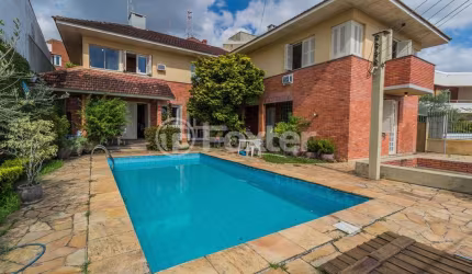 Casa com 5 quartos à venda na Rua Dona Lida Monteiro, 80, Teresópolis, Porto Alegre, 445 m2 por R$ 1.500.000