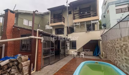 Casa com 4 quartos à venda na Rua Joaquim Cruz, 30, Santo Antônio, Porto Alegre, 256 m2 por R$ 1.149.000