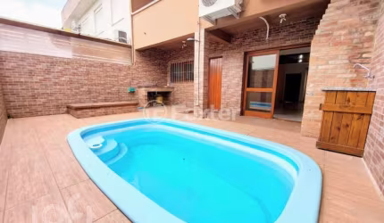 Casa em condomínio fechado com 3 quartos à venda na Rua Guatambu, 106, Hípica, Porto Alegre, 209 m2 por R$ 650.000