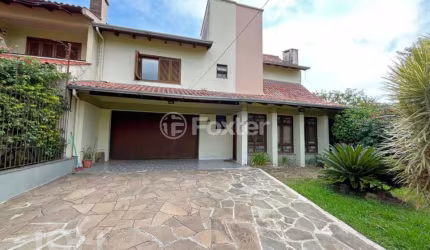Casa com 3 quartos à venda na Avenida Karl Iwers, 367, Jardim Itu Sabará, Porto Alegre, 242 m2 por R$ 1.100.000