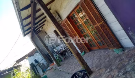 Casa com 3 quartos à venda na Rua Doutor Olavo Fernandez, 870, Estância Velha, Canoas, 100 m2 por R$ 373.000