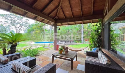 Casa em condomínio fechado com 6 quartos à venda na Avenida Juca Batista, 8000, Belém Novo, Porto Alegre, 450 m2 por R$ 2.900.000