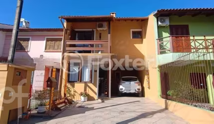 Casa com 3 quartos à venda na Rua Edgar Sanches Laurent, 46, Hípica, Porto Alegre, 180 m2 por R$ 750.000