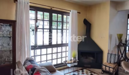 Casa com 3 quartos à venda na Rua Itaboraí, 1335, Jardim Botânico, Porto Alegre, 266 m2 por R$ 1.600.000