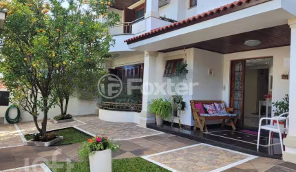 Casa com 6 quartos à venda na Rua Irmão Agnelo Chaves, 170, Marechal Rondon, Canoas, 448 m2 por R$ 1.730.000