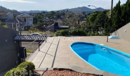 Casa com 3 quartos à venda na Rua Florença, 1950, Canudos, Novo Hamburgo, 261 m2 por R$ 850.000
