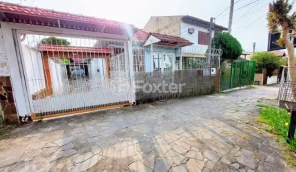 Casa com 3 quartos à venda na Rua Sebastião Wolf, 181, Nonoai, Porto Alegre, 180 m2 por R$ 868.900
