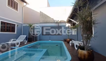 Casa com 3 quartos à venda na Rua Suécia, 209, Marechal Rondon, Canoas, 190 m2 por R$ 1.225.000