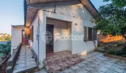Casa com 5 quartos à venda na Rua Vladimir Herzog, 486, Jardim Carvalho, Porto Alegre, 109 m2 por R$ 332.500