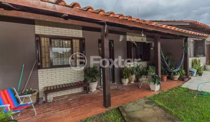 Casa com 3 quartos à venda na Rua Emílio Dimari, 190, Ponta Grossa, Porto Alegre, 130 m2 por R$ 530.000