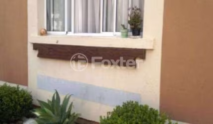 Casa em condomínio fechado com 3 quartos à venda na Rua Tenente Ary Tarrago, 1720, Jardim Itu Sabará, Porto Alegre, 85 m2 por R$ 380.000