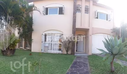 Casa em condomínio fechado com 4 quartos à venda na Avenida Edgar Pires de Castro, 1100, Boa Vista do Sul, Porto Alegre, 164 m2 por R$ 425.000