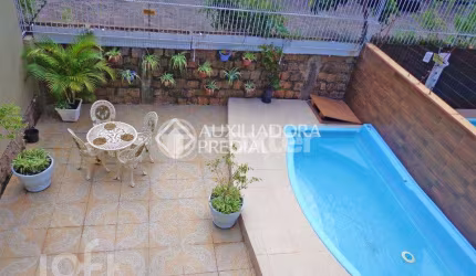 Casa com 3 quartos à venda na Acesso A, 89, Hípica, Porto Alegre, 210 m2 por R$ 958.000