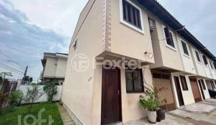 Casa em condomínio fechado com 3 quartos à venda na Rua Vereador Adão Da Silva Santos, 230, São José, Canoas, 112 m2 por R$ 500.000