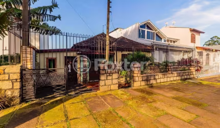 Casa comercial com 1 sala à venda na Rua Arnaldo Ballve, 186, Jardim Itu Sabará, Porto Alegre, 250 m2 por R$ 280.000