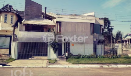 Casa com 3 quartos à venda na Rua Marco Aurélio Hidalgo, 17, Nossa Senhora das Graças, Canoas, 173 m2 por R$ 850.000