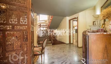 Casa com 4 quartos à venda na Rua Alcebíades Antônio dos Santos, 142, Nonoai, Porto Alegre, 290 m2 por R$ 1.649.000