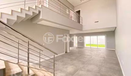 Casa em condomínio fechado com 3 quartos à venda na Rua dos Pinheiros, 141, Igara, Canoas, 232 m2 por R$ 1.980.000