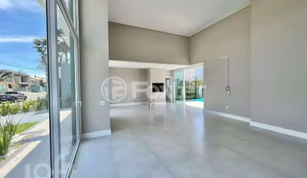 Casa em condomínio fechado com 3 quartos à venda na Avenida Central, 2000, Zona Nova, Capão da Canoa, 150 m2 por R$ 1.850.000