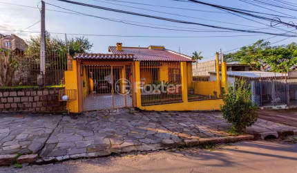 Casa com 3 quartos à venda na Avenida Delmar Rocha Barbosa, 699, Parque Santa Fé, Porto Alegre, 103 m2 por R$ 650.000