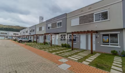 Casa em condomínio fechado com 2 quartos à venda na Estrada Cristiano Kraemer, 5018, Vila Nova, Porto Alegre, 87 m2 por R$ 299.000