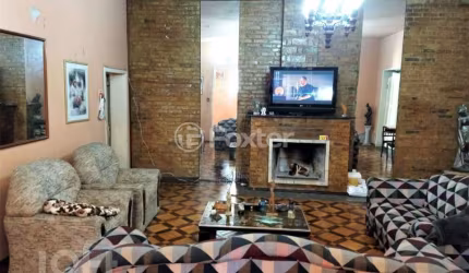 Casa com 3 quartos à venda na Rua Coronel Neves, 472, Medianeira, Porto Alegre, 450 m2 por R$ 1.600.000