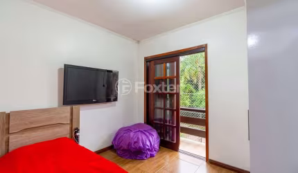 Casa com 3 quartos à venda na Rua Waldemar Guido Vicentini, 433, Dom Feliciano, Gravataí, 160 m2 por R$ 423.000