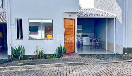 Casa em condomínio fechado com 2 quartos à venda na Avenida Prefeito Barreto Viana, 413, Cecília, Viamão, 71 m2 por R$ 265.001