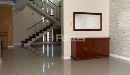 Casa com 4 quartos à venda na Avenida Fábio Araújo Santos, 1164, Nonoai, Porto Alegre, 329 m2 por R$ 1.138.100