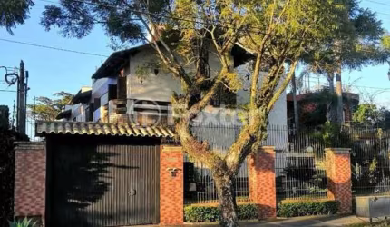 Casa em condomínio fechado com 3 quartos à venda na Avenida Guaíba, 10930, Ipanema, Porto Alegre, 190 m2 por R$ 750.000