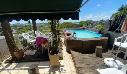 Casa com 3 quartos à venda na Rua Natércia Cunha Veloso, 267, Morro Santana, Porto Alegre, 270 m2 por R$ 798.000