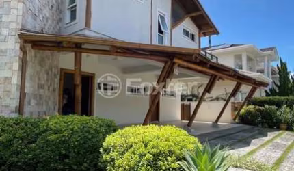 Casa em condomínio fechado com 4 quartos à venda na Rodovia Doutor Antônio Luiz Moura Gonzaga, 3801, Rio Tavares, Florianópolis, 450 m2 por R$ 4.900.000