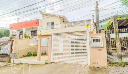 Casa com 3 quartos à venda na Rua Patrício de Matos Fernandes, 143, Santa Tereza, Porto Alegre, 239 m2 por R$ 490.000