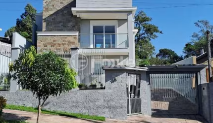 Casa com 3 quartos à venda na Rua Jacarandá, 198, São José, Sapucaia do Sul, 300 m2 por R$ 1.200.000