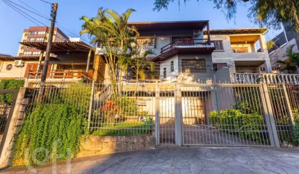 Casa com 6 quartos à venda na Rua Fernando Abbott, 1055, Cristo Redentor, Porto Alegre, 360 m2 por R$ 1.300.000
