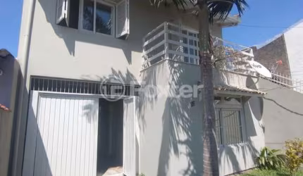 Casa com 3 quartos à venda na Rua Carlos Sá, 92, Morada do Vale III, Gravataí, 138 m2 por R$ 606.575