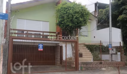 Casa com 3 quartos à venda na Rua Vladimir Herzog, 35, Jardim Carvalho, Porto Alegre, 253 m2 por R$ 650.000